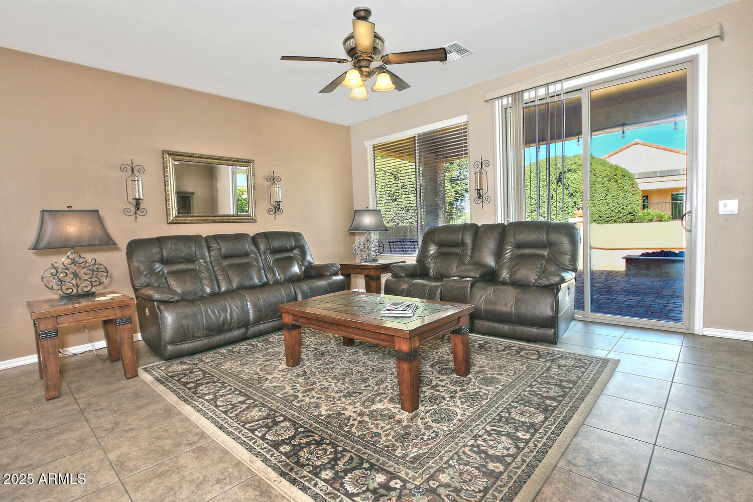 7382 West Silver Spring Way Florence, AZ 85132 - Photo 17 of 89 a living room with furniture and a large window