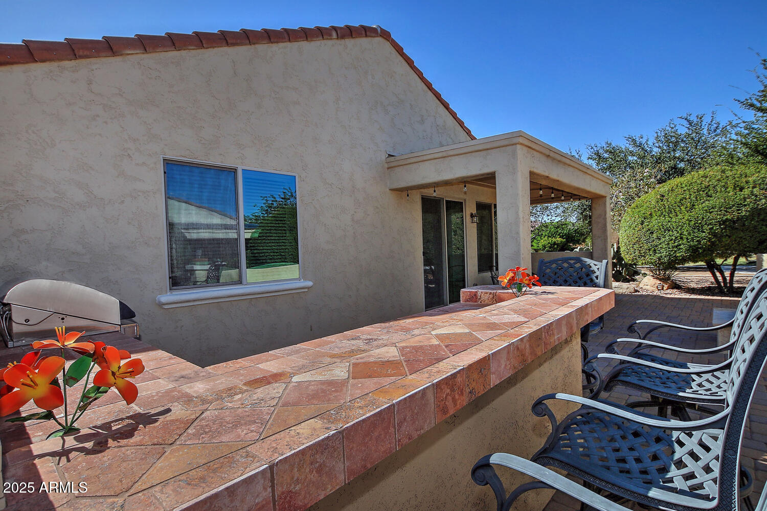 7382 West Silver Spring Way Florence, AZ 85132 - Photo 21 of 89 a view of an chairs and tables in the balcony