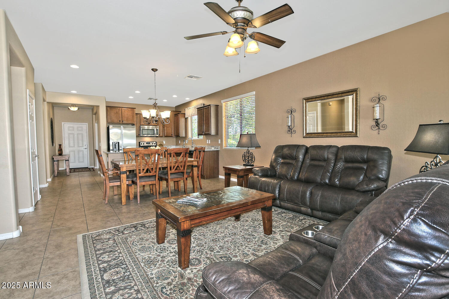 7382 West Silver Spring Way Florence, AZ 85132 - Photo 25 of 89 a living room with furniture and a view of kitchen