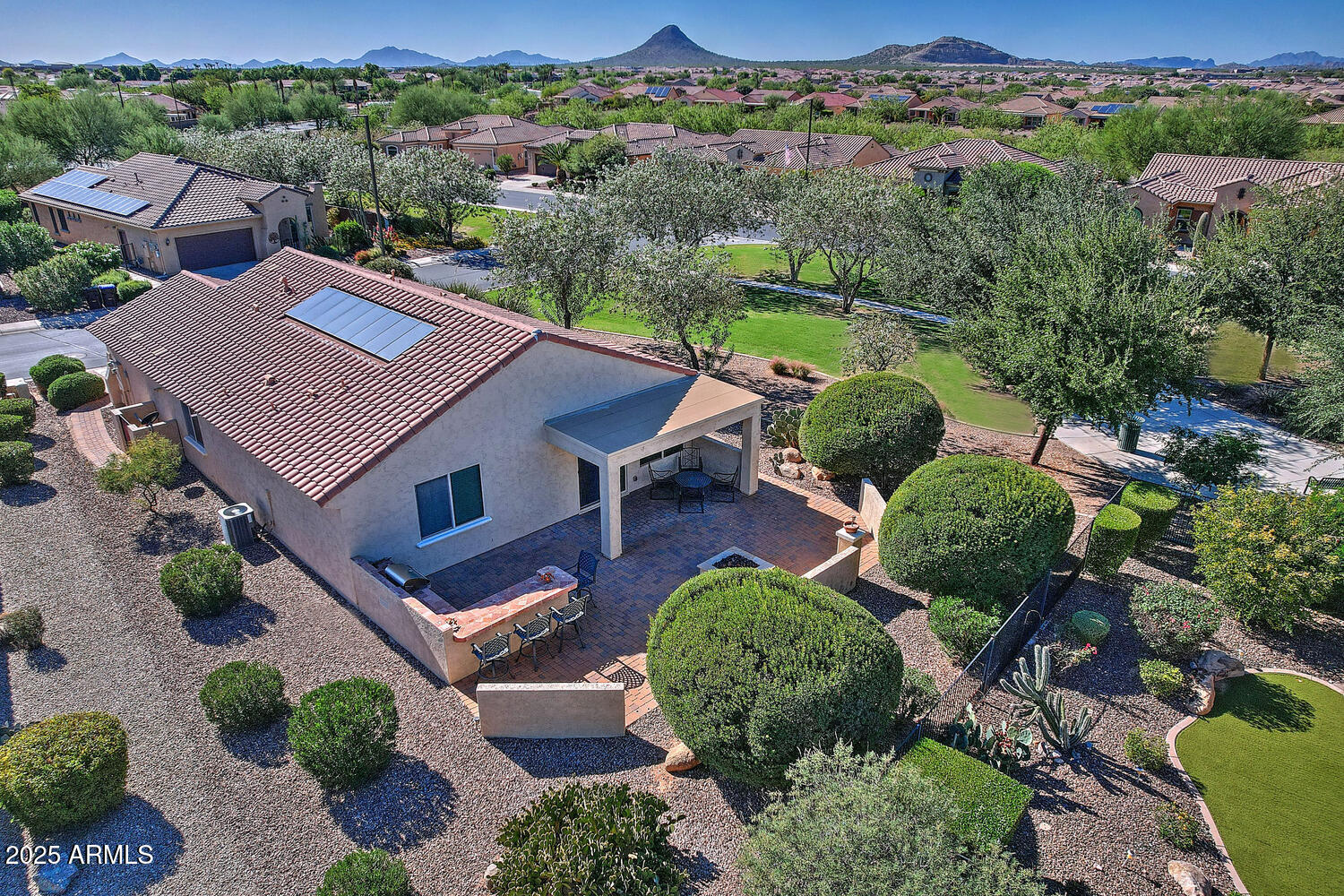 7382 West Silver Spring Way Florence, AZ 85132 - Photo 3 of 89 an aerial view of a house with garden space and street view