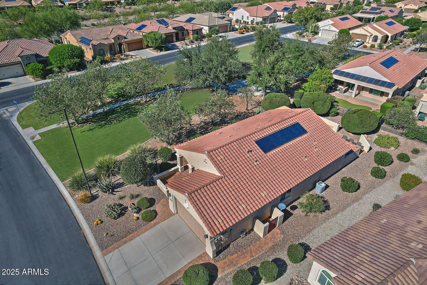 7382 West Silver Spring Way Florence, AZ 85132 - Photo 39 of 89 an aerial view of a house with a garden