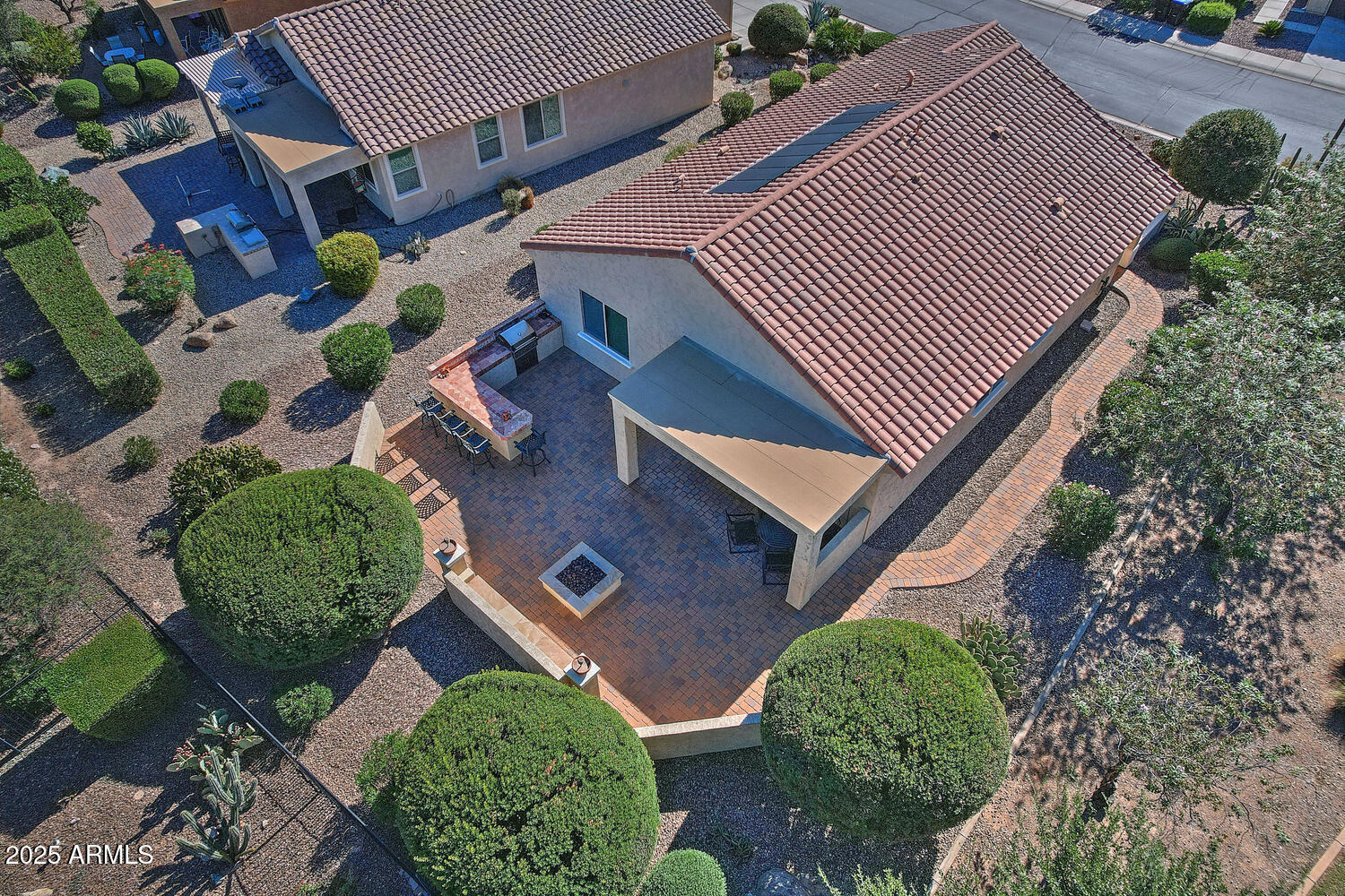 7382 West Silver Spring Way Florence, AZ 85132 - Photo 4 of 89 an aerial view of a house with a yard and plants