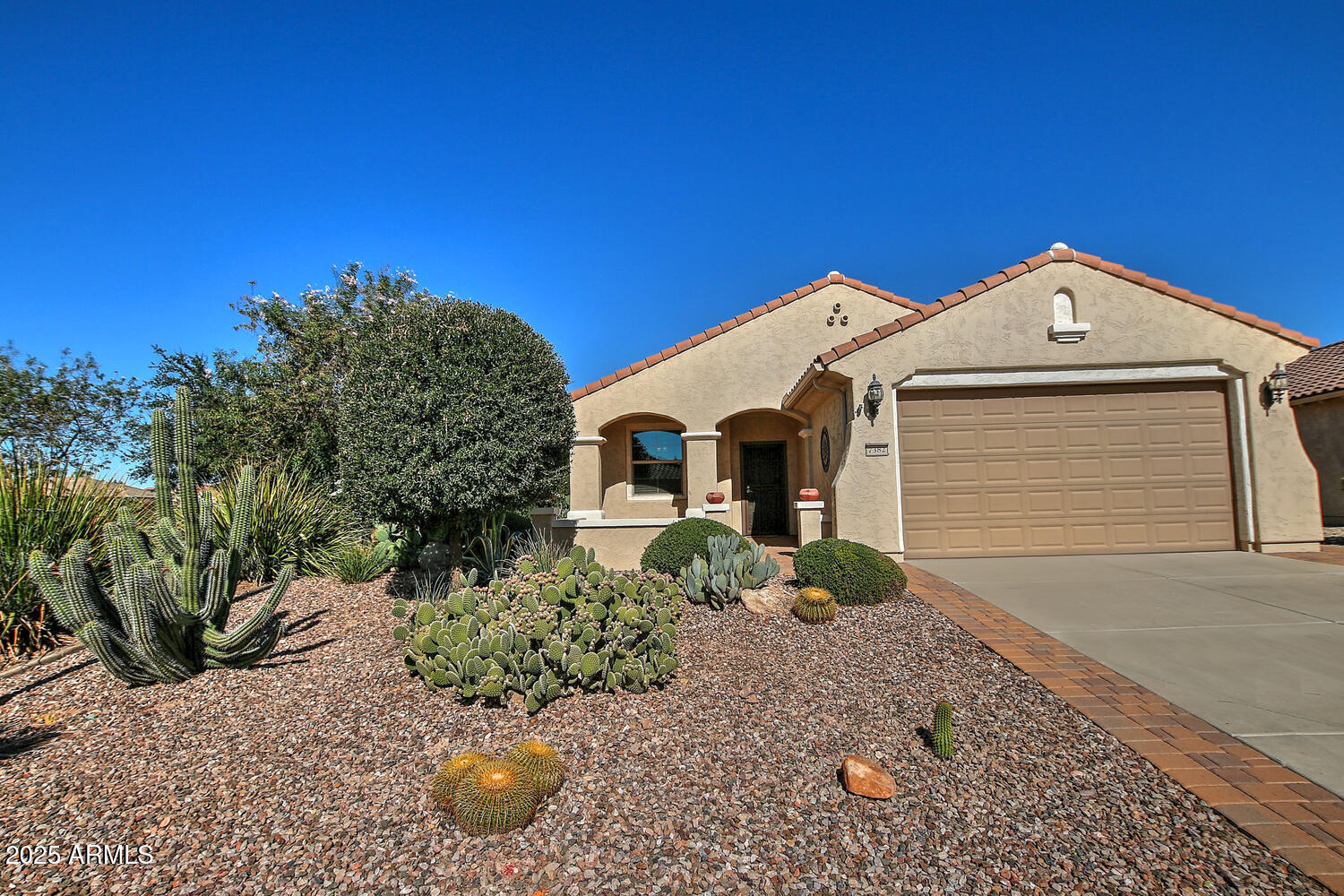 7382 West Silver Spring Way Florence, AZ 85132 - Photo 5 of 89 a front view of a house with porch