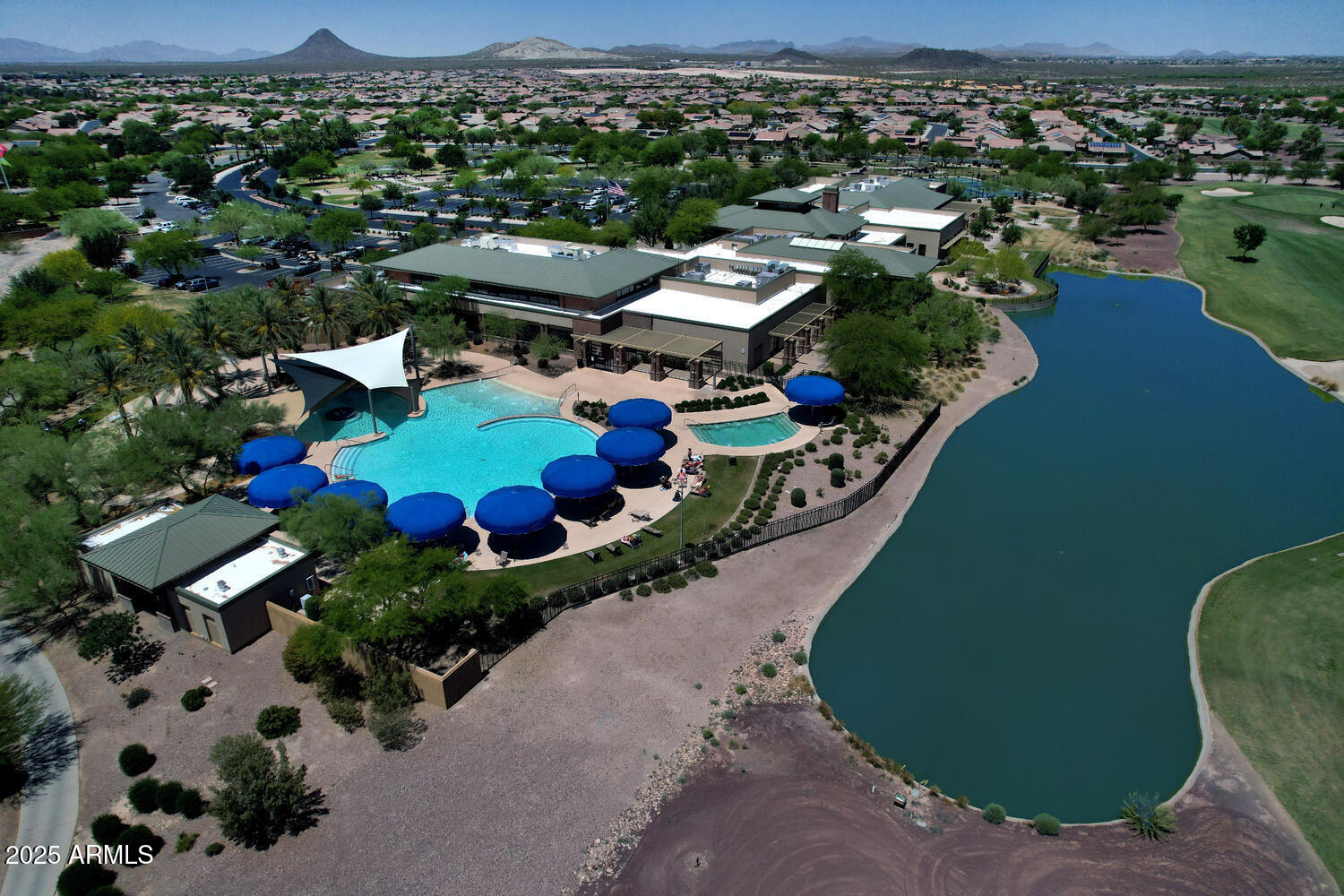 7382 West Silver Spring Way Florence, AZ 85132 - Photo 55 of 89 an aerial view of a house with a swimming pool yard and outdoor seating