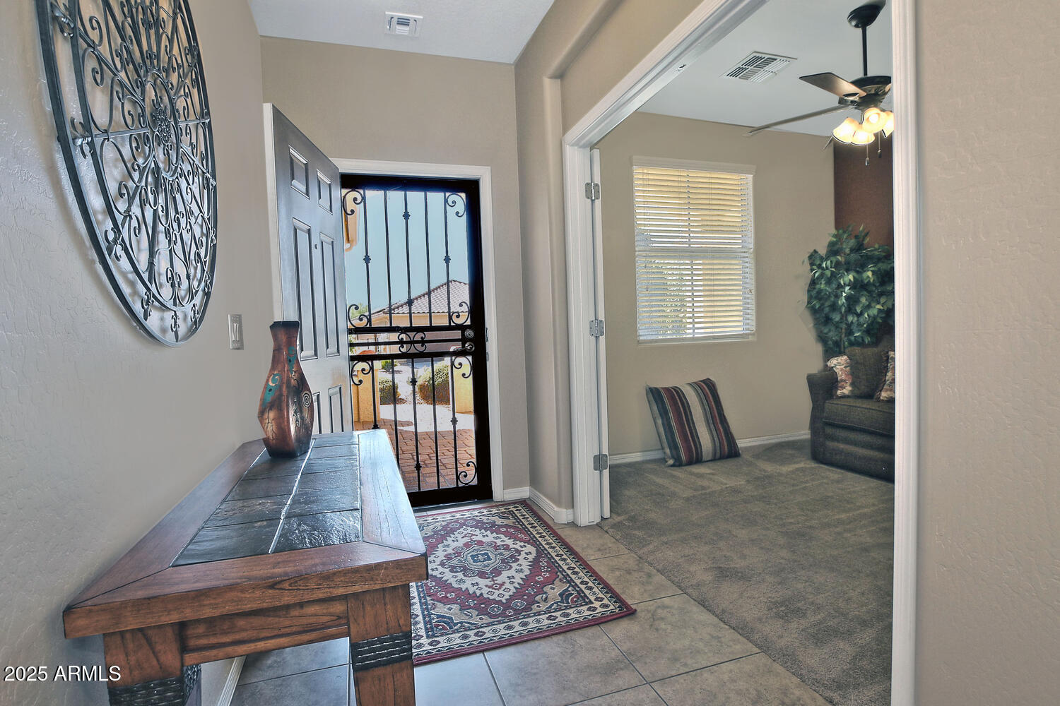7382 West Silver Spring Way Florence, AZ 85132 - Photo 8 of 89 a view of hall way with furniture and staircase