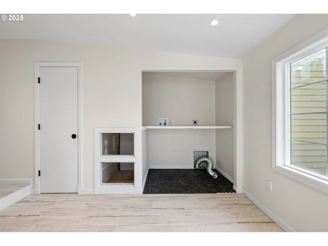 a room with a window and closet