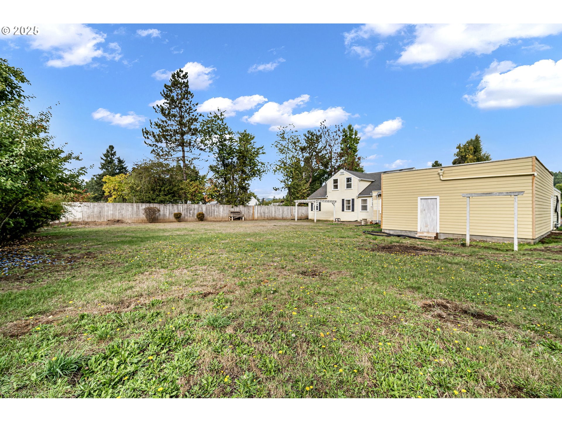 1115 South 6th Street Cottage Grove, OR 97424 - Photo 36 of 38 a view of a house with a yard