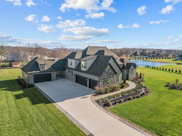 a view of a house with a big yard