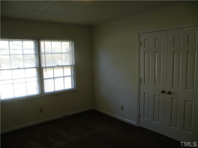 2109 James Slaughter Road Fuquay-Varina, NC 27526 - Photo 9 of 14 one of the three bedrooms with ceiling fans and overhead light Bedroom