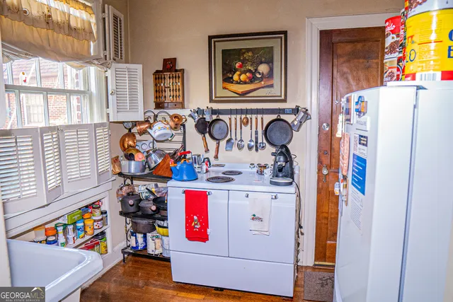 a utility room with furniture and a window