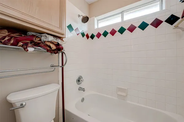 a bathroom with a sink and a bathtub