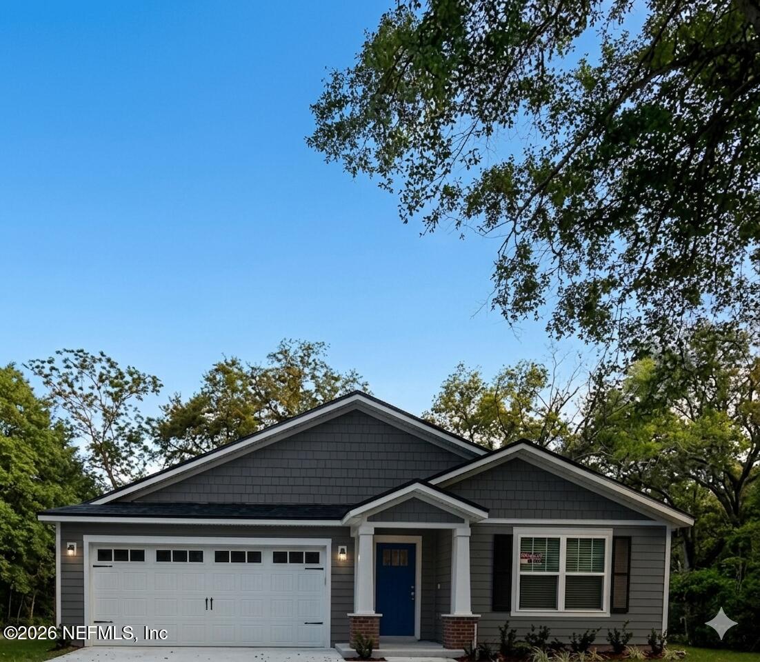 451 Cahoon Road North Jacksonville, FL 32220 - Photo 1 of 33 a front view of a house with a yard
