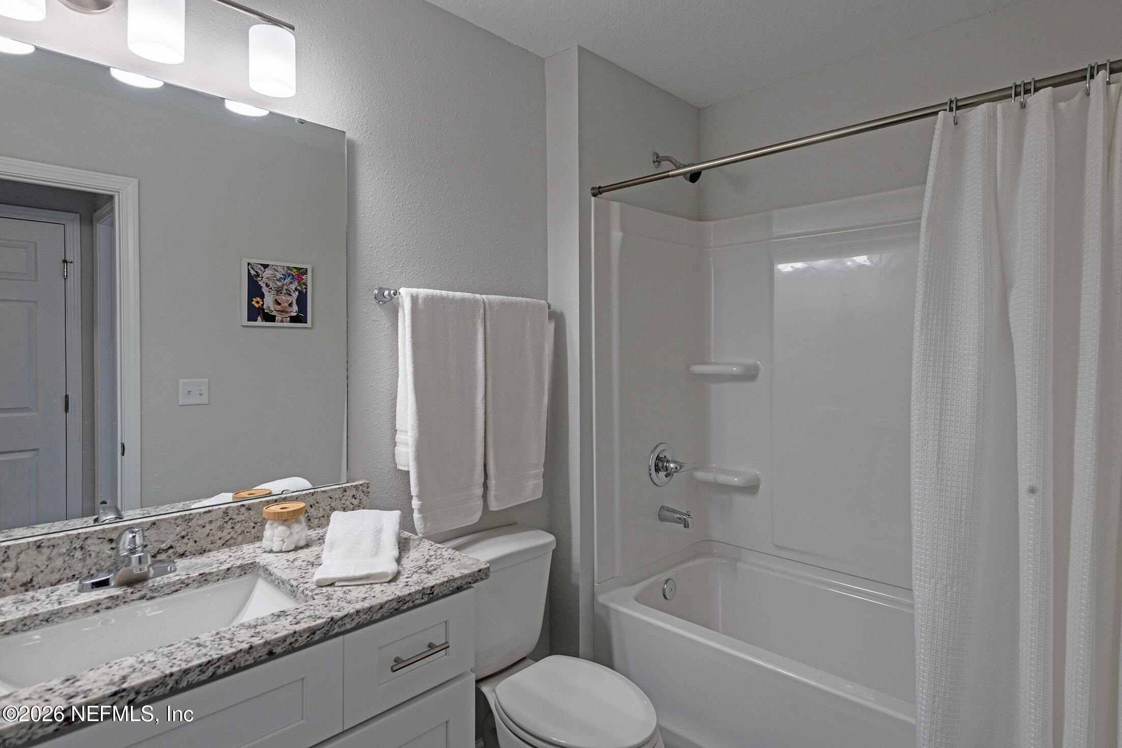 451 Cahoon Road North Jacksonville, FL 32220 - Photo 28 of 33 a bathroom with a granite countertop sink toilet and shower