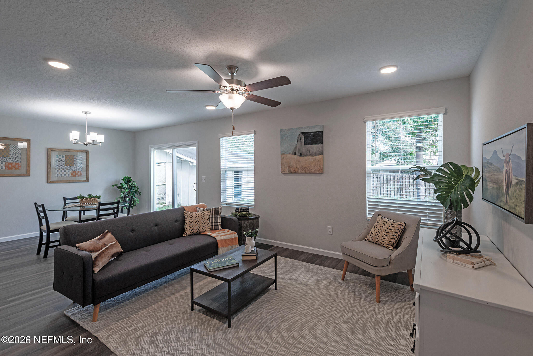 451 Cahoon Road North Jacksonville, FL 32220 - Photo 10 of 33 a living room with furniture and a large window
