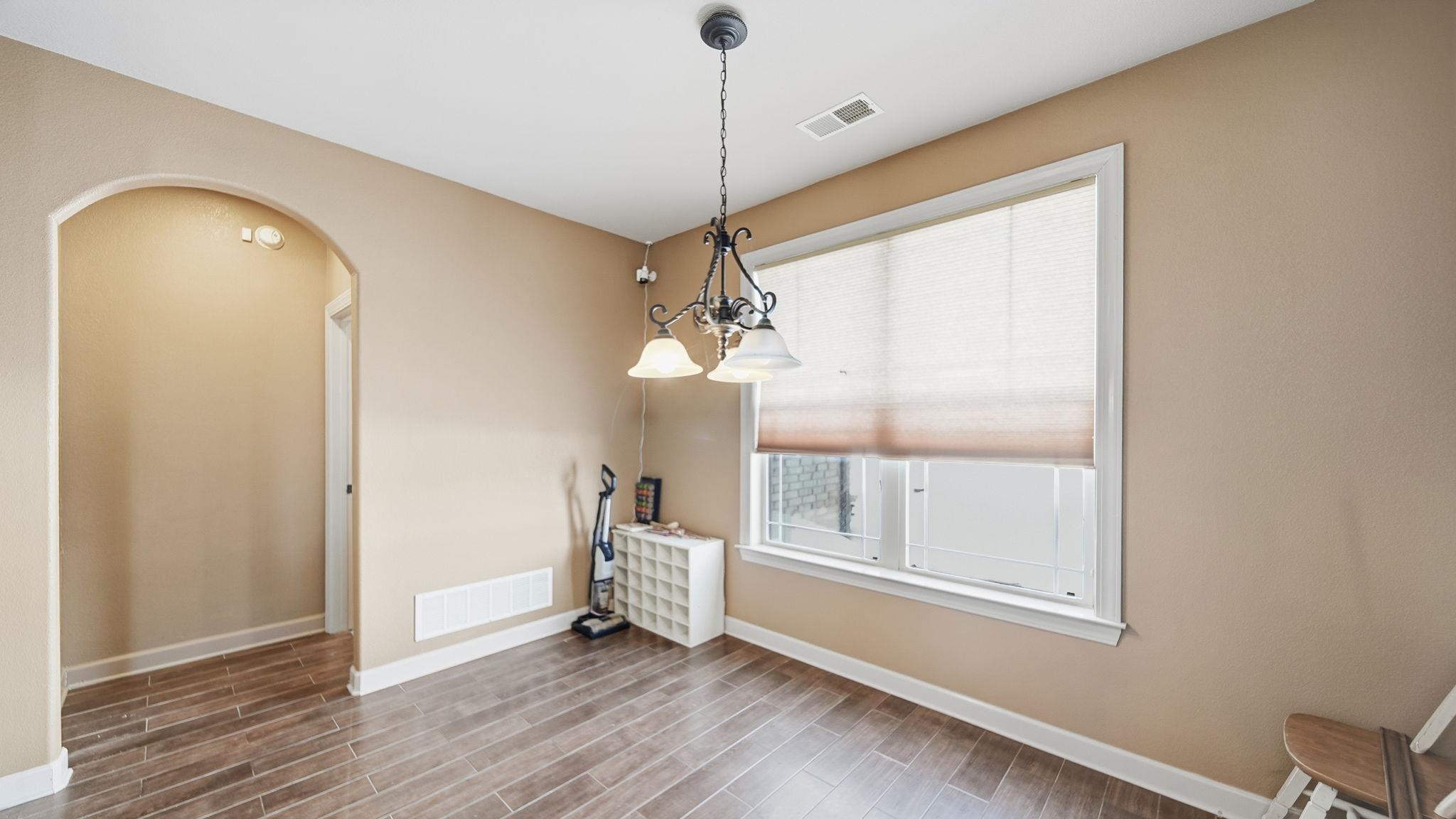 34 Carson Cove Atoka, TN 38004 - Photo 12 of 27 a view of a room with wooden floor and windows