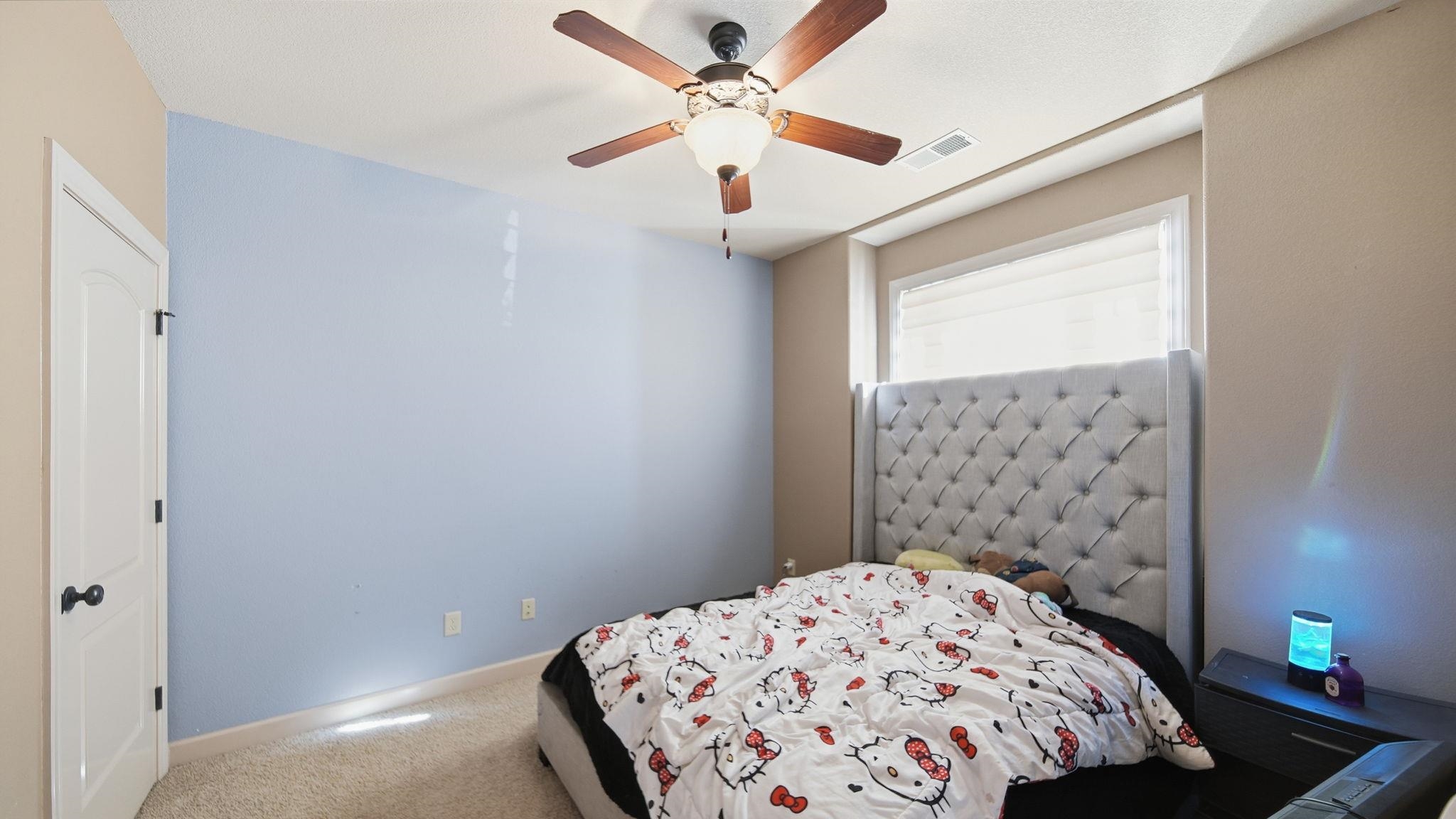 34 Carson Cove Atoka, TN 38004 - Photo 13 of 27 a bedroom with a bed and a window