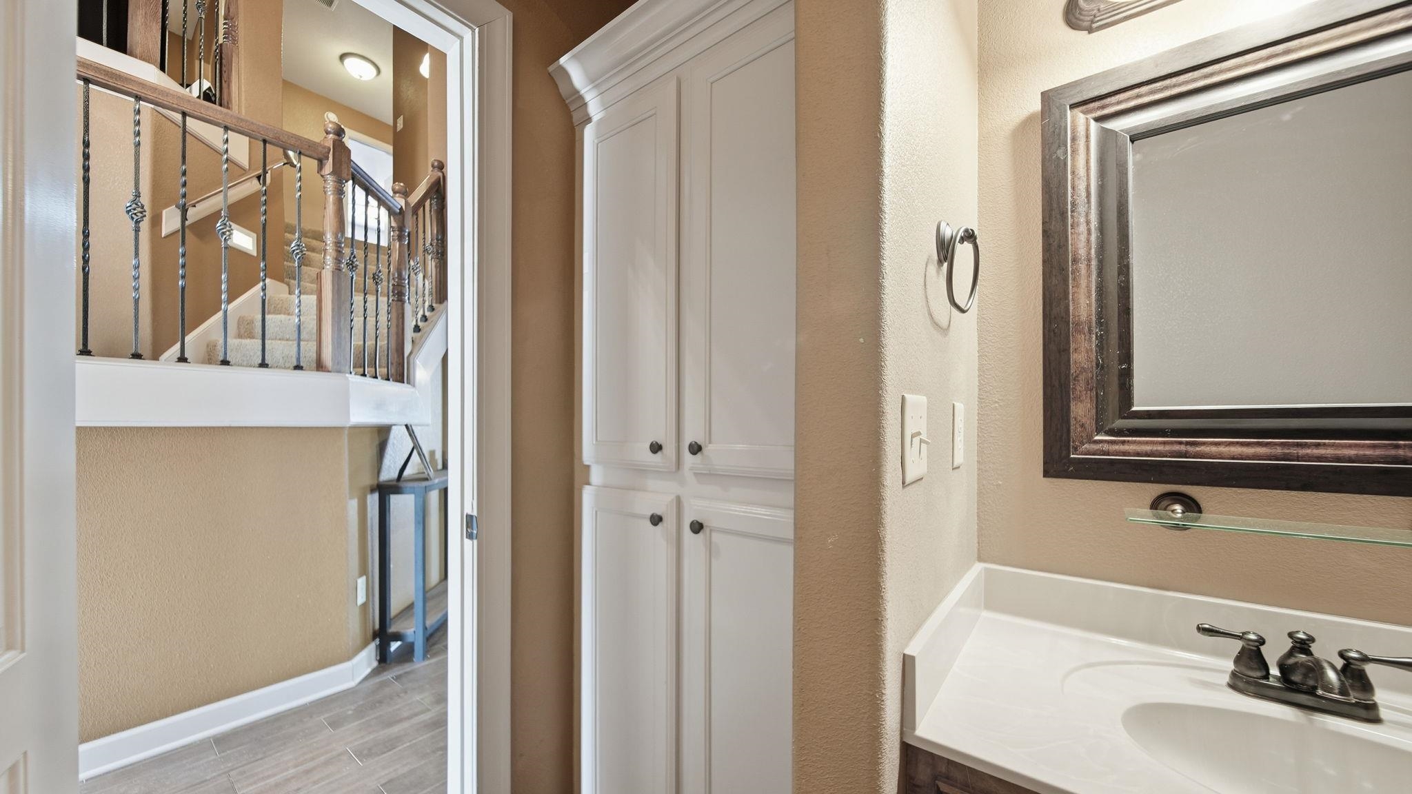 34 Carson Cove Atoka, TN 38004 - Photo 14 of 27 a bathroom with a sink and a mirror