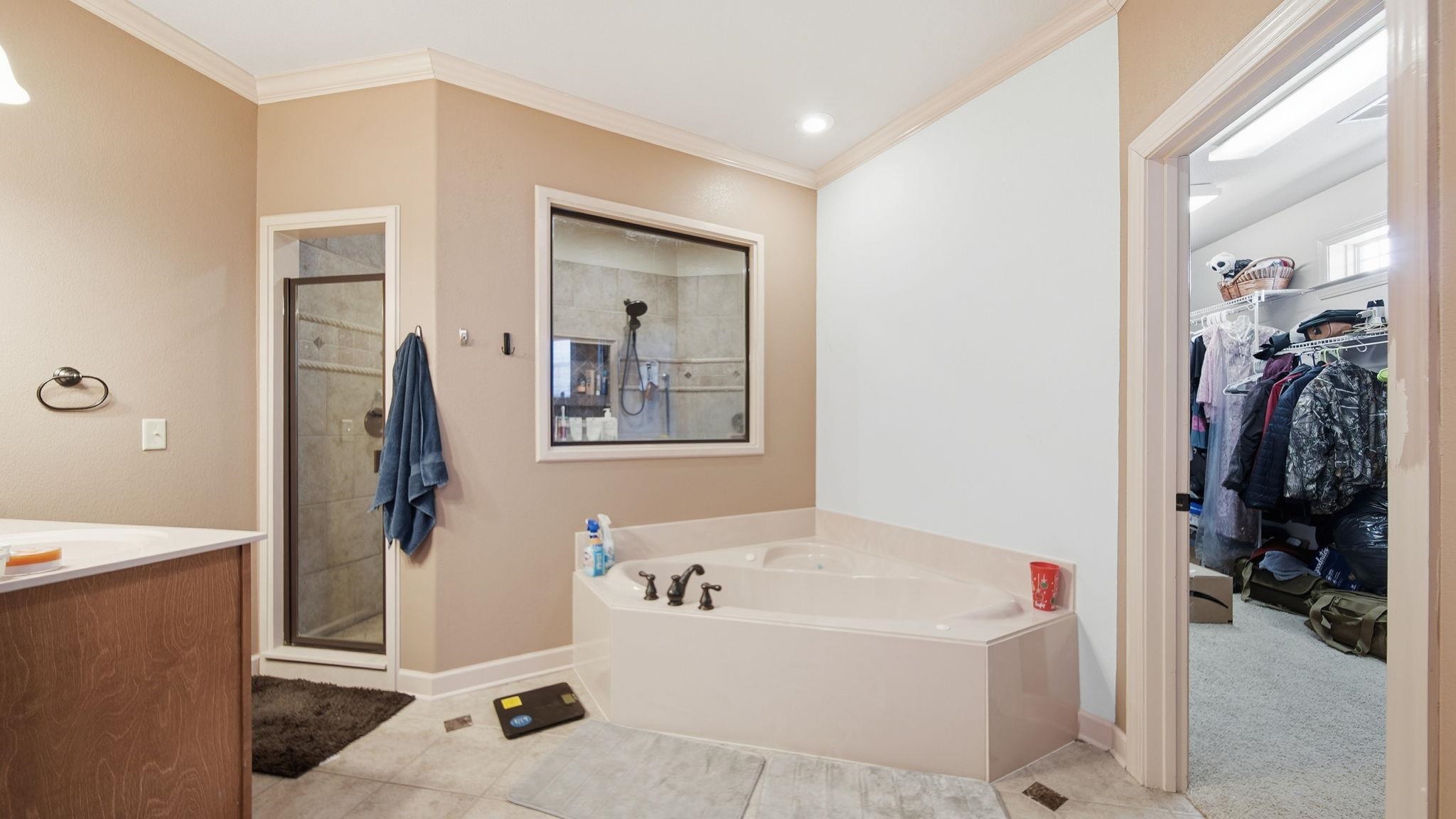 34 Carson Cove Atoka, TN 38004 - Photo 18 of 27 a bathroom with a tub and a view of bathroom