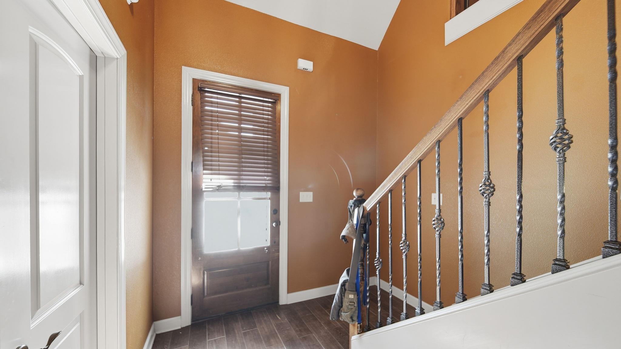 34 Carson Cove Atoka, TN 38004 - Photo 6 of 27 a view of staircase with wooden floor and stairs