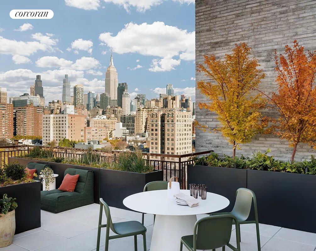 428 West 19th Street, Unit 4D Manhattan, NY 10011 - Photo 9 of 15 a balcony with table and chairs