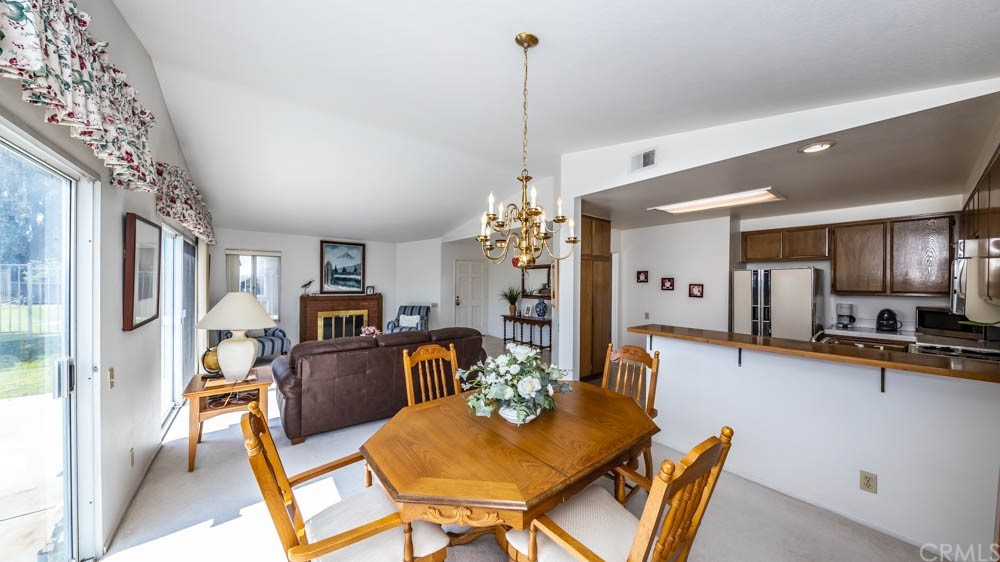 3540 Vista Glen Circle Yorba Linda, CA 92886 - Photo 12 of 31 a view of a dining room with furniture window and wooden floor