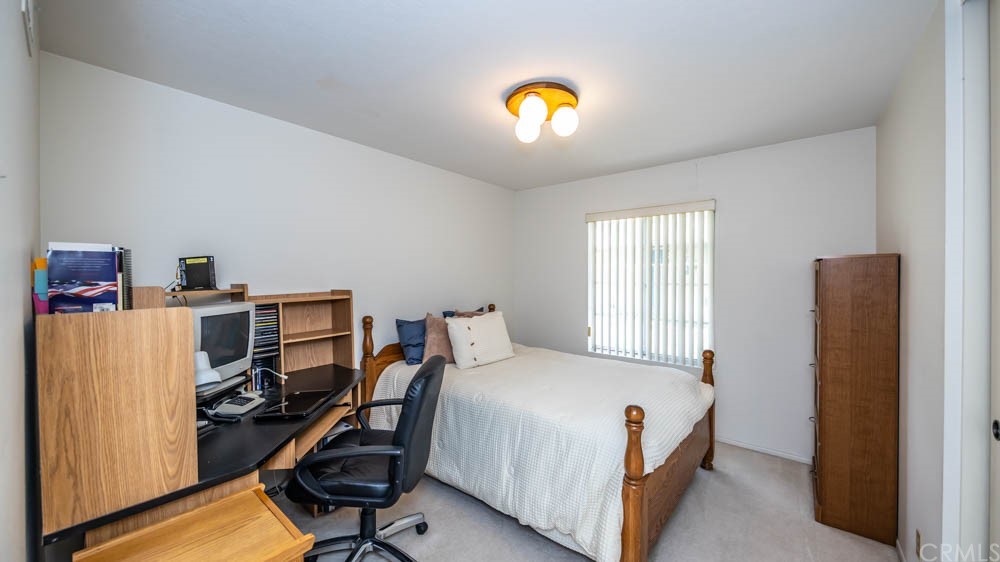 3540 Vista Glen Circle Yorba Linda, CA 92886 - Photo 17 of 31 a bedroom with a bed and wooden floor