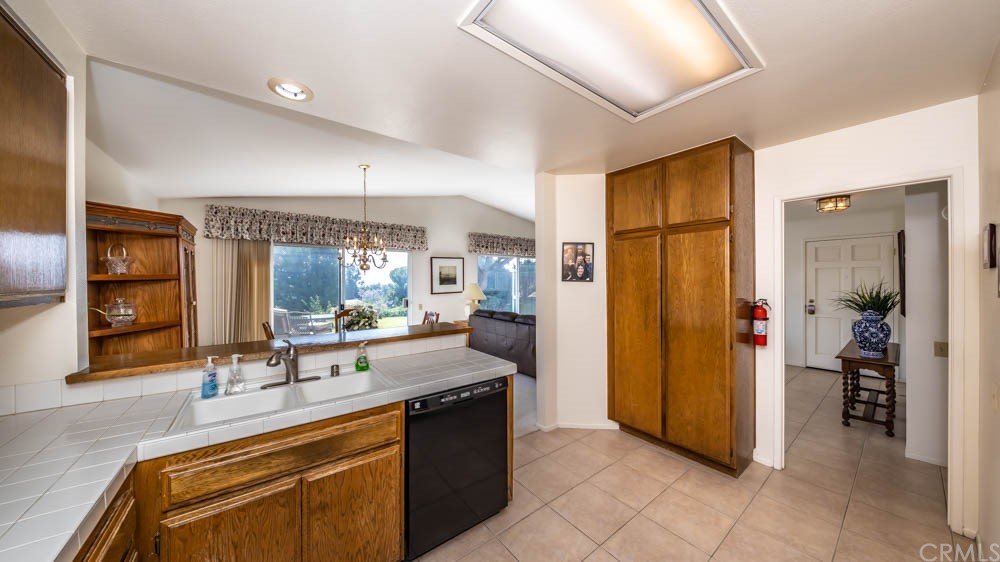 3540 Vista Glen Circle Yorba Linda, CA 92886 - Photo 18 of 31 a kitchen with stainless steel appliances granite countertop a refrigerator and a sink