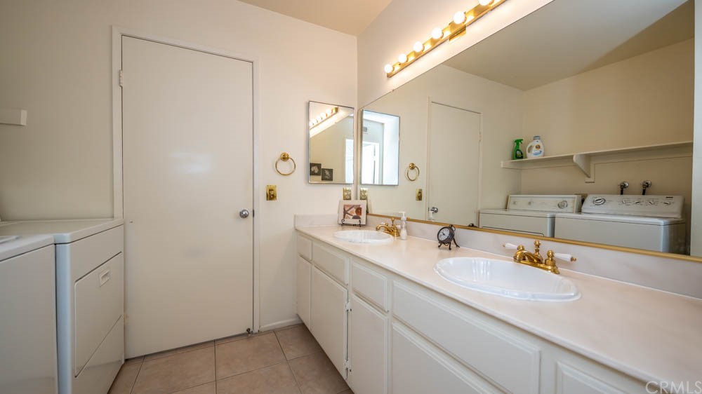 3540 Vista Glen Circle Yorba Linda, CA 92886 - Photo 24 of 31 a bathroom with a sink and a mirror