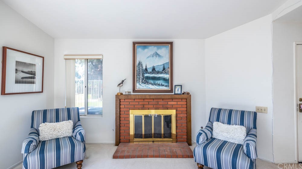 3540 Vista Glen Circle Yorba Linda, CA 92886 - Photo 27 of 31 a living room with furniture and a fireplace