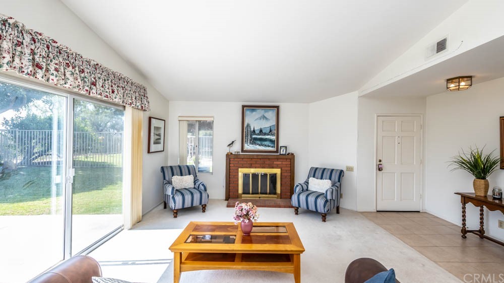 3540 Vista Glen Circle Yorba Linda, CA 92886 - Photo 3 of 31 a living room with furniture and a fireplace