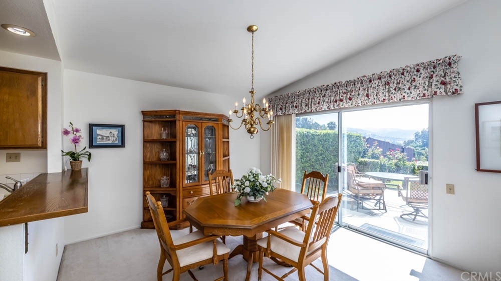 3540 Vista Glen Circle Yorba Linda, CA 92886 - Photo 5 of 31 a dining room with furniture a chandelier and window