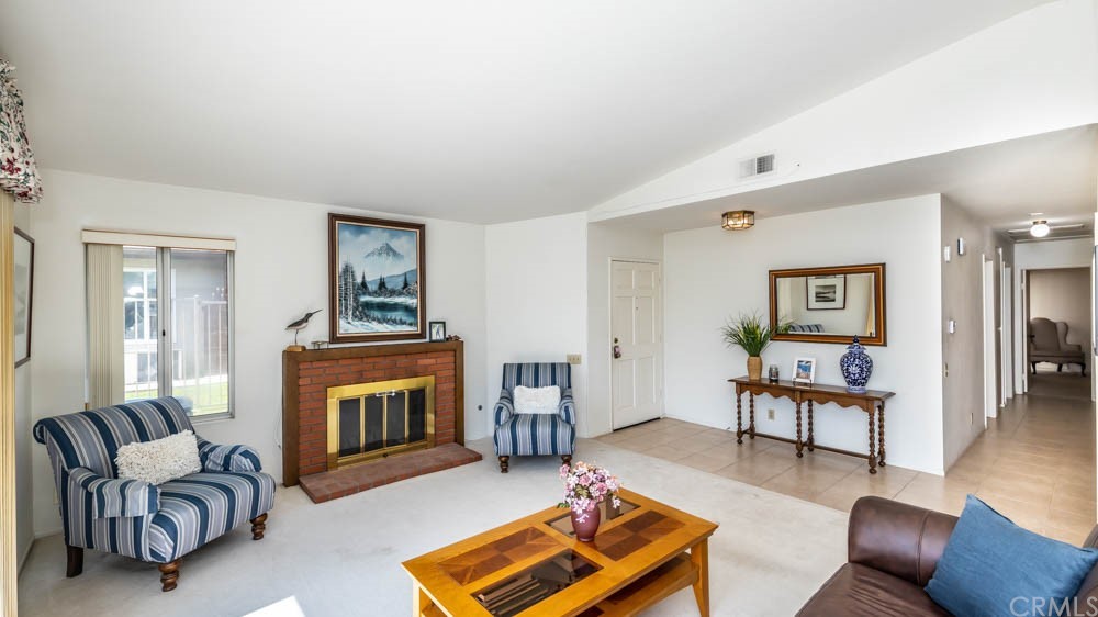 3540 Vista Glen Circle Yorba Linda, CA 92886 - Photo 7 of 31 a living room with furniture and a fireplace