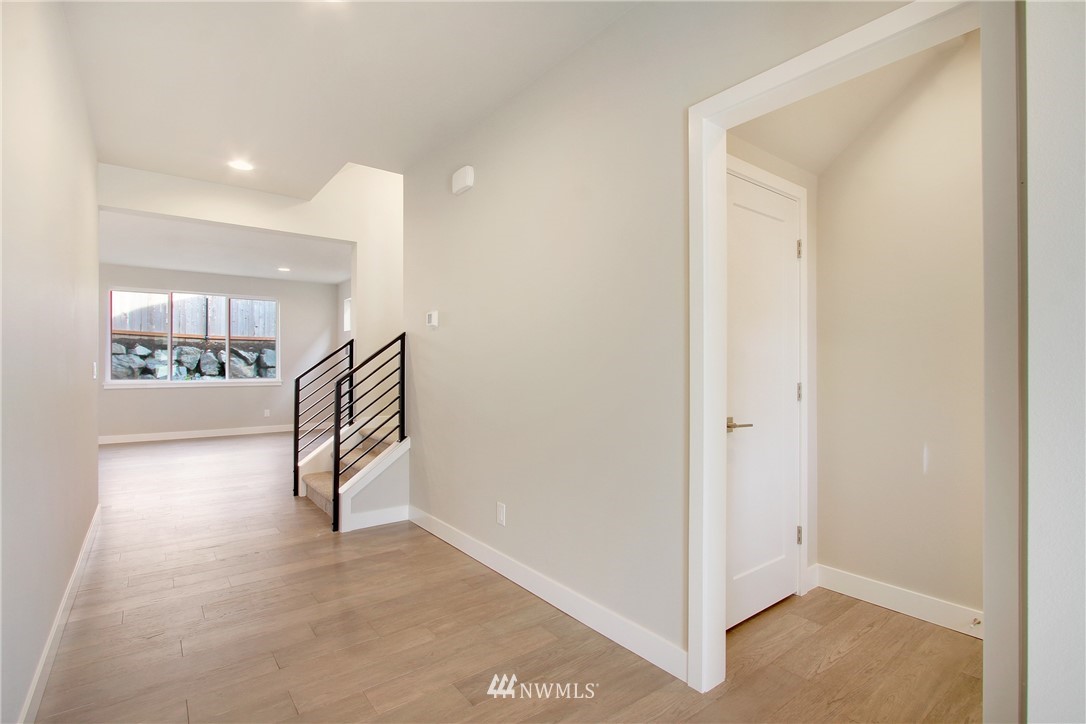 210 180th Place Southwest, Unit CT 01 Bothell, WA 98012 - Photo 2 of 19 a view of an empty room and a window