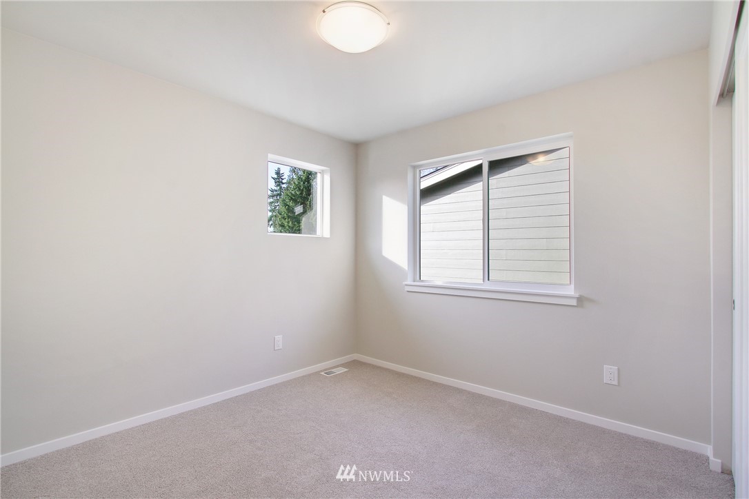 210 180th Place Southwest, Unit CT 01 Bothell, WA 98012 - Photo 17 of 19 an empty room with windows