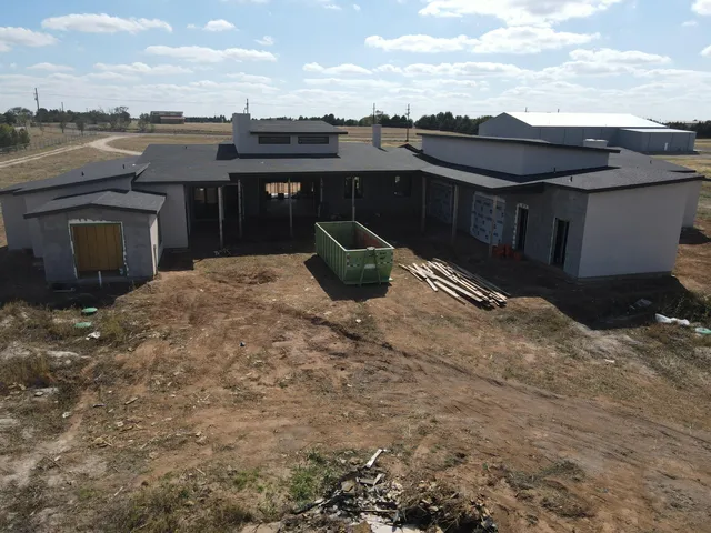 a view of a terrace with a barbeque