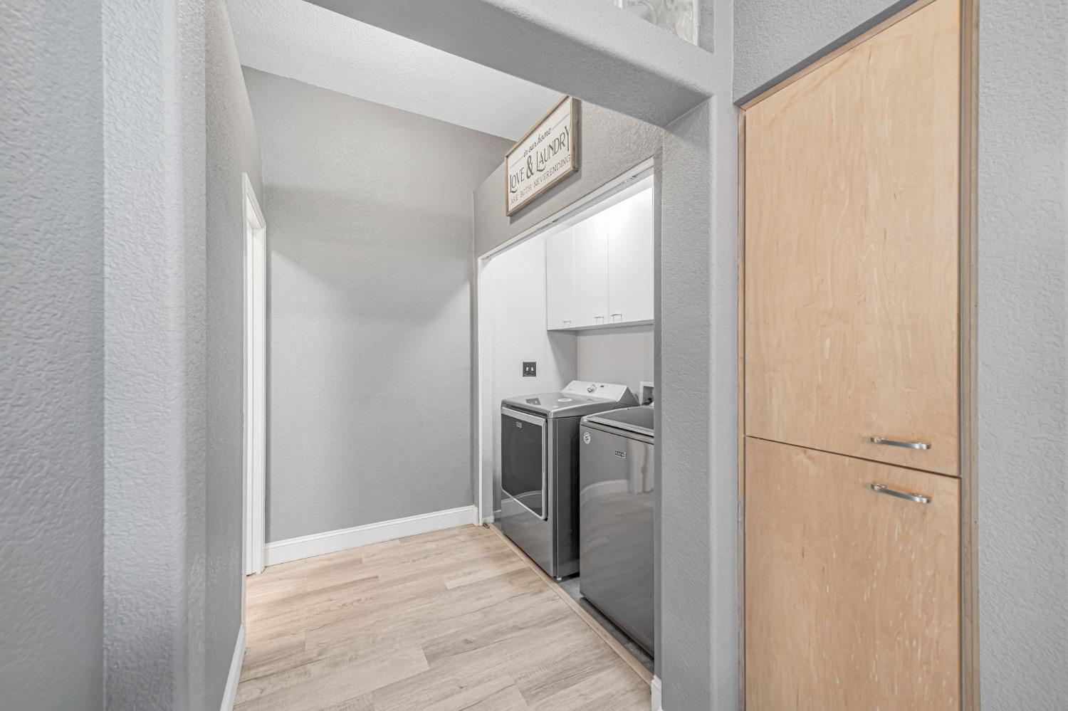 9065 Robbins Road Sacramento, CA 95829 - Photo 38 of 45 a view of a kitchen from the hallway