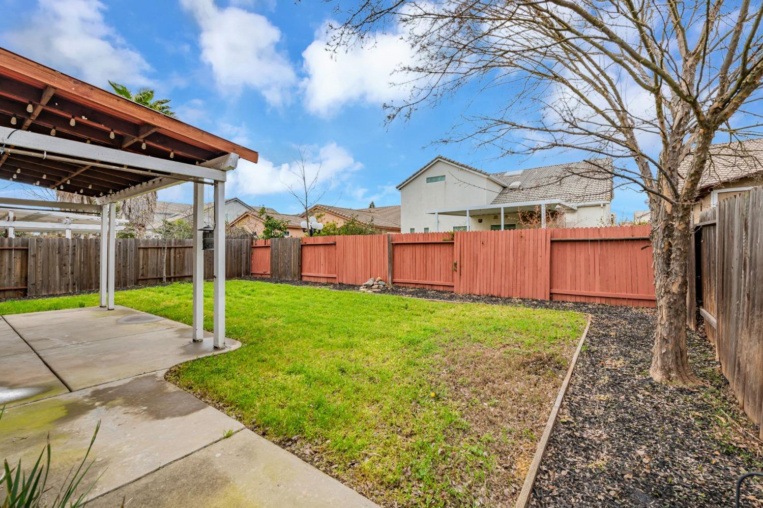 9065 Robbins Road Sacramento, CA 95829 - Photo 45 of 45 a view of a backyard with a garden