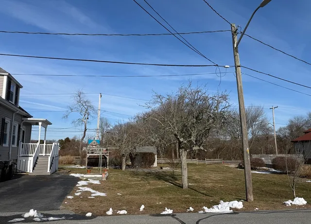 a view of a water fountain in the street