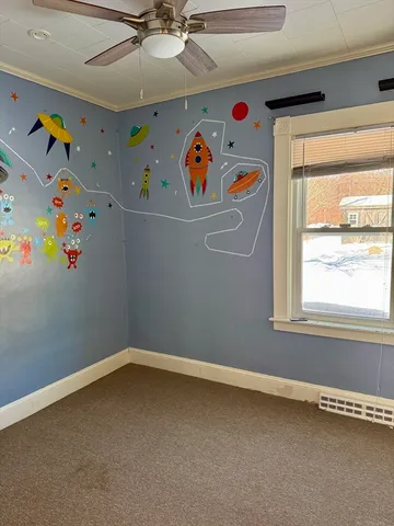 a storage & utility room with a window