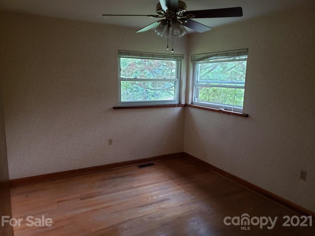 419 Old Michael Road Canton, NC 28716 - Photo 12 of 15 an empty room with a window