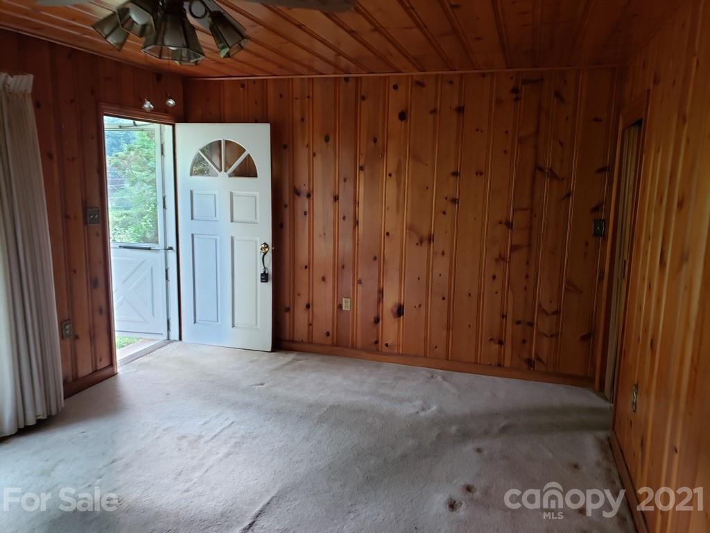 419 Old Michael Road Canton, NC 28716 - Photo 8 of 15 a view of an empty room with a window