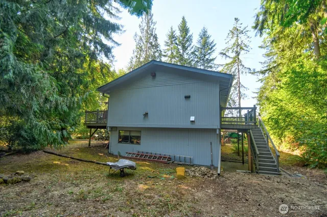 a house with trees in the background