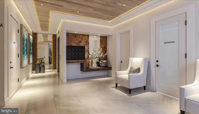 a spacious en suite bathroom with a toilet tub and shower