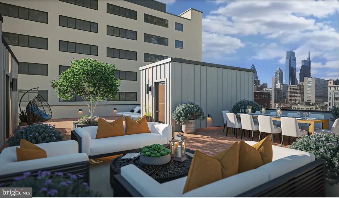 326 North 12th Street, Unit 202 Philadelphia, PA 19107 - Photo 9 of 11 a outdoor living space with patio furniture and potted plants