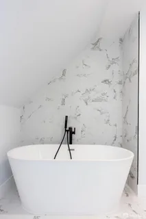 a bathroom with a bathtub