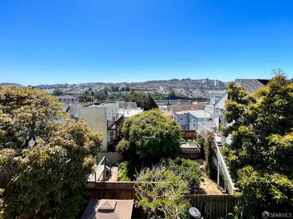 a view of a lake with a building in the background