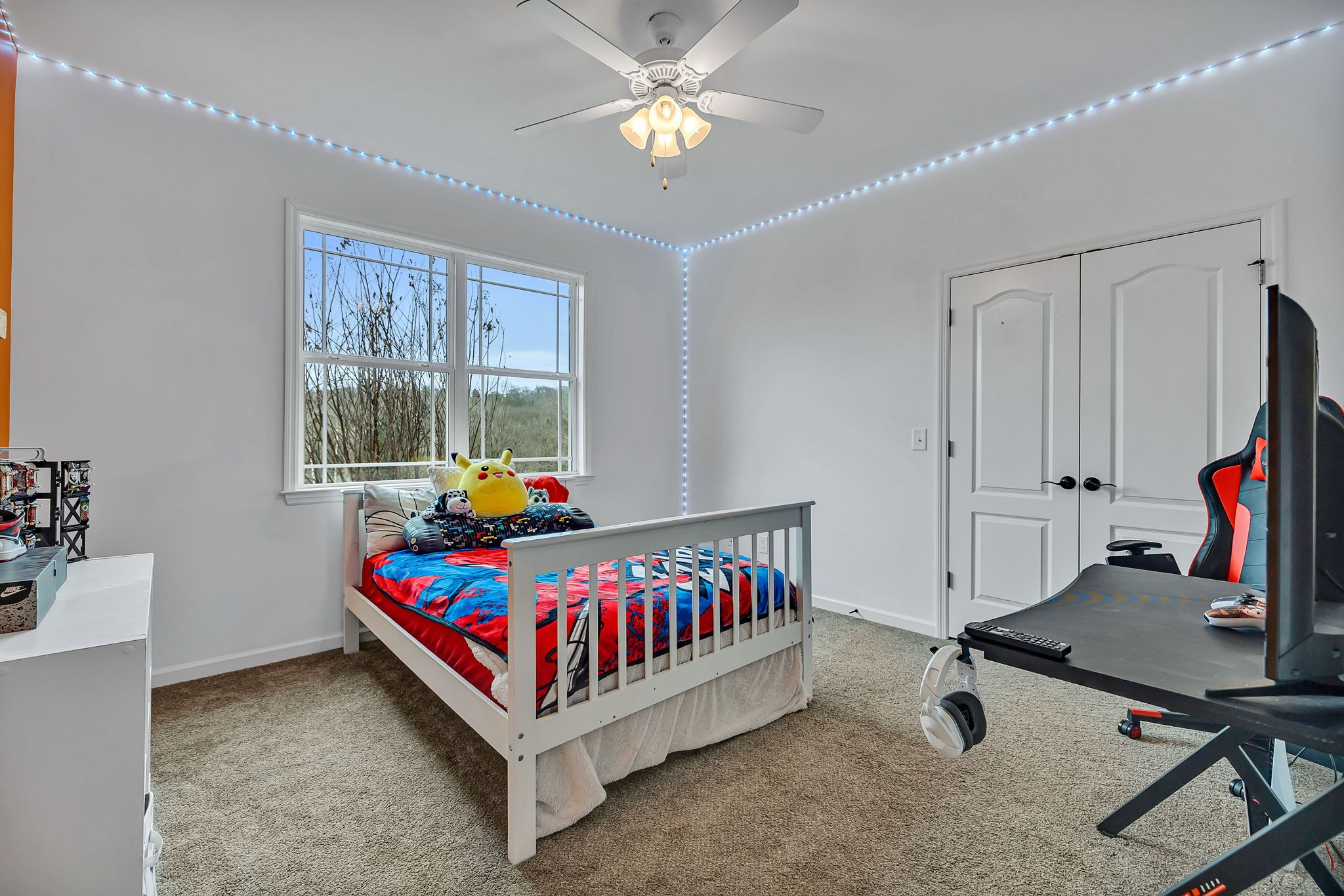 1349 Cliff Amos Road Spring Hill, TN 37174 - Photo 17 of 48 a bedroom with furniture and a window
