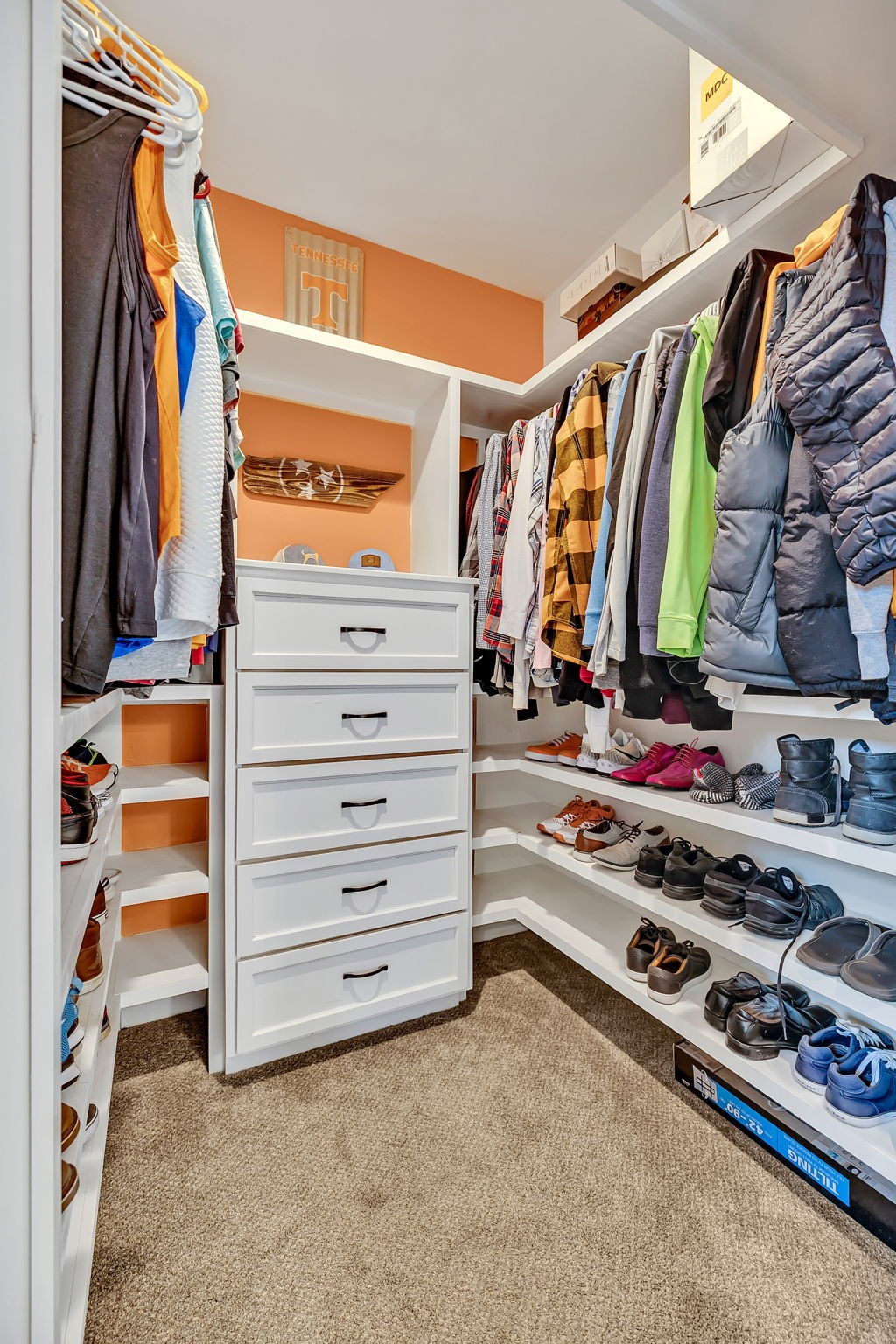 1349 Cliff Amos Road Spring Hill, TN 37174 - Photo 33 of 48 a view of walk in closet with clothes and shoes
