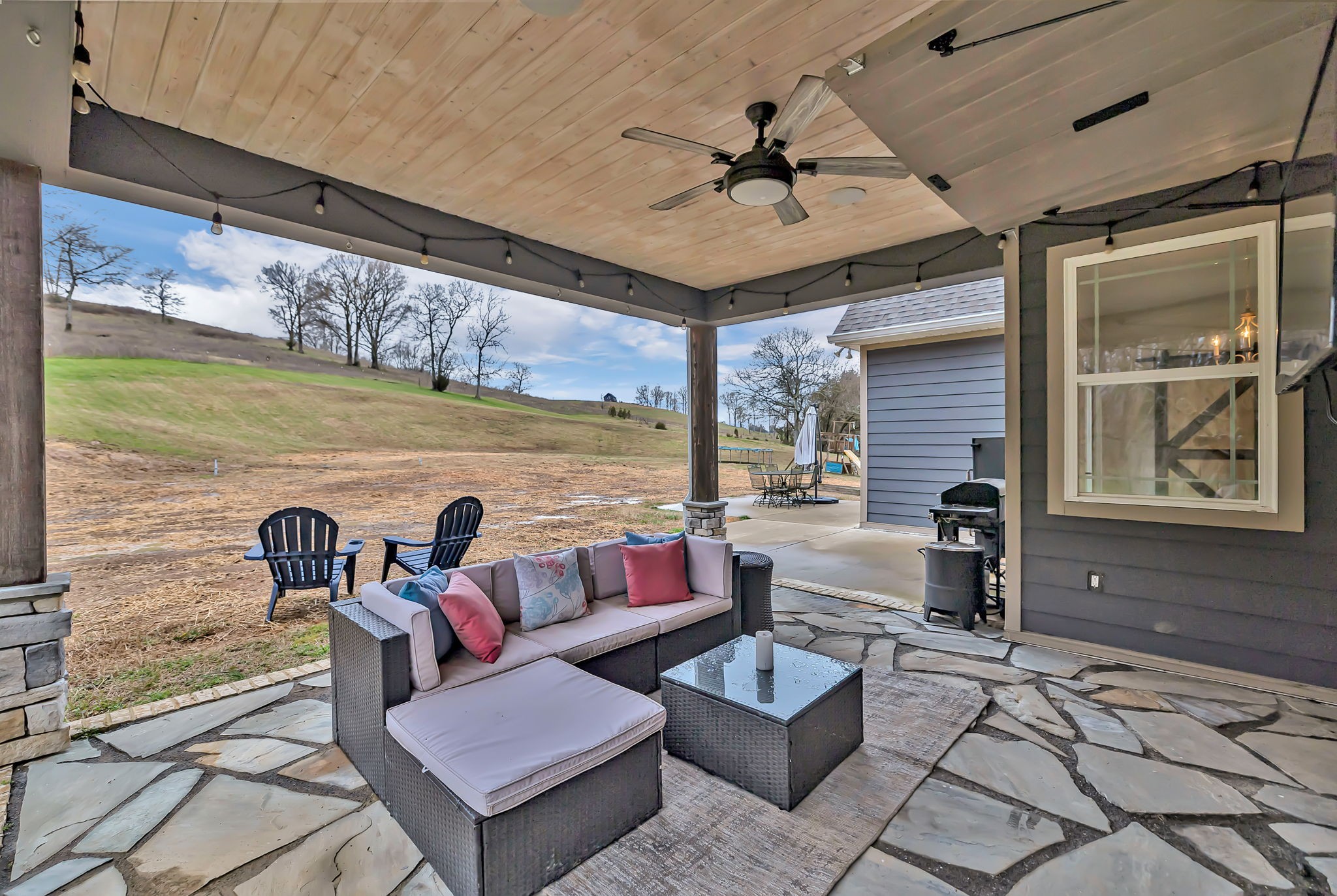 1349 Cliff Amos Road Spring Hill, TN 37174 - Photo 34 of 48 a outdoor living space with patio furniture