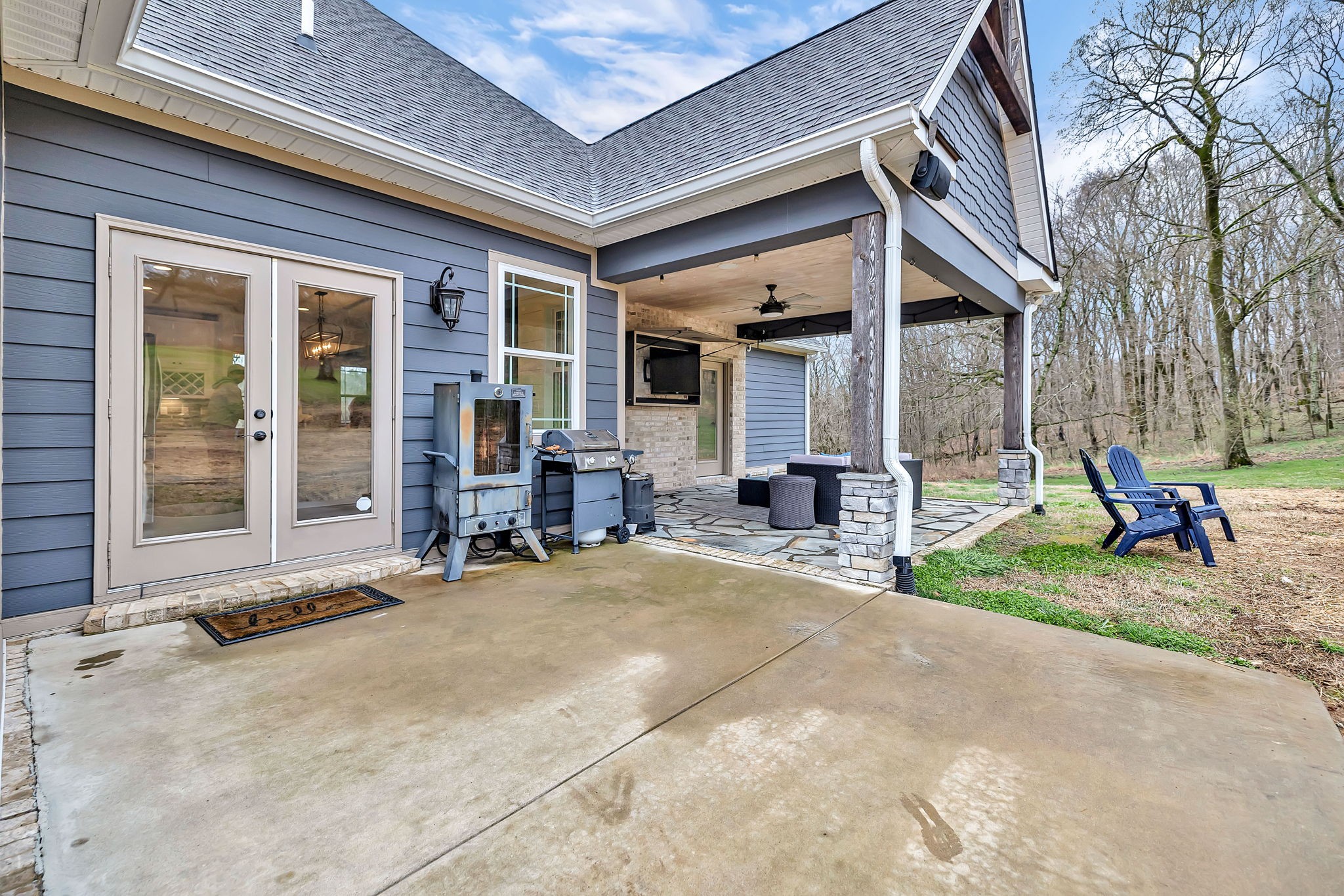 1349 Cliff Amos Road Spring Hill, TN 37174 - Photo 36 of 48 a view of the house with backyard and sitting area